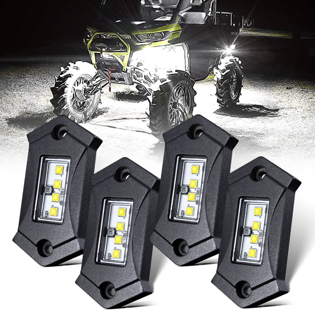 LEDMIRCY R3 white LED rock lights 4-pack shown with illuminated off-road UTV at night for truck, ATV, and rock crawling underglow lighting